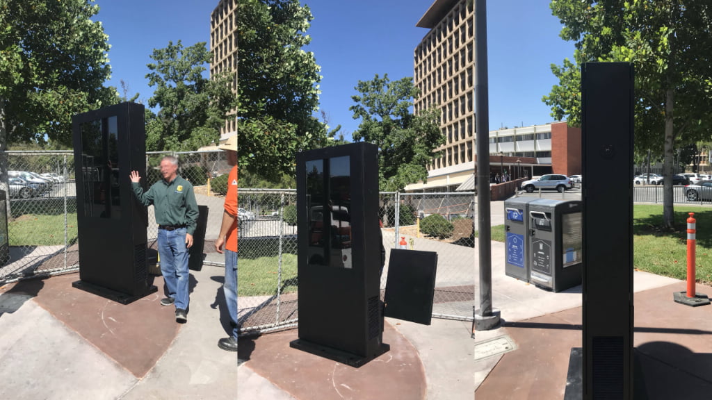 Outdoor freestanding digital kiosk installation showing weather-resistant wayfinding and information display in public space