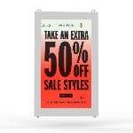Outdoor wall-mounted digital signage display showing 50% off sale promotion with weatherproof enclosure and mounting brackets