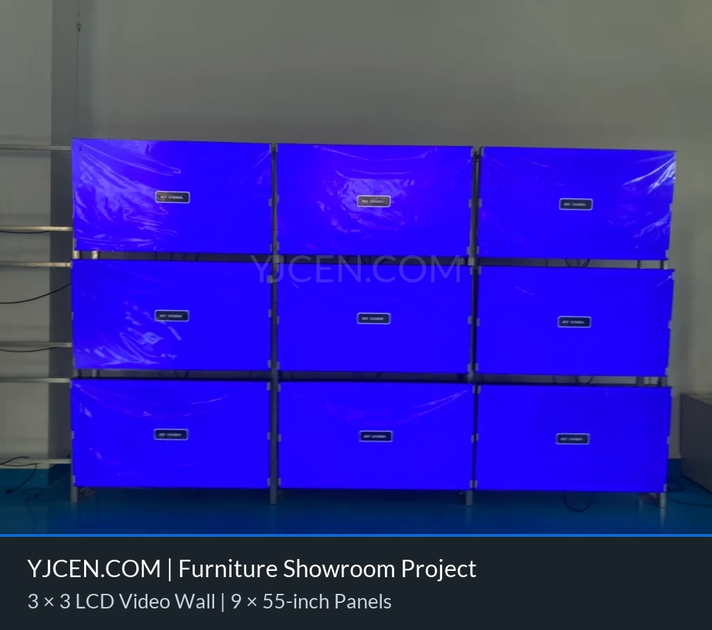 3×3-Videowand aus 55-Zoll-LCDs mit ultraschmalen Rahmen bei Montage und Kalibrierung mit synchronem blauem Testbild auf neun Displays