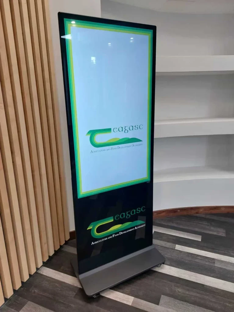 Black floor-standing display indoors, with Teagasc branding on the screen and the front of the enclosure.