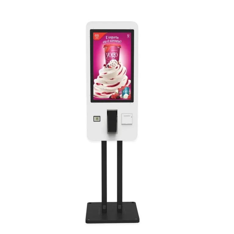 White self-ordering kiosk with a portrait touchscreen, front payment hardware and a black floor stand.