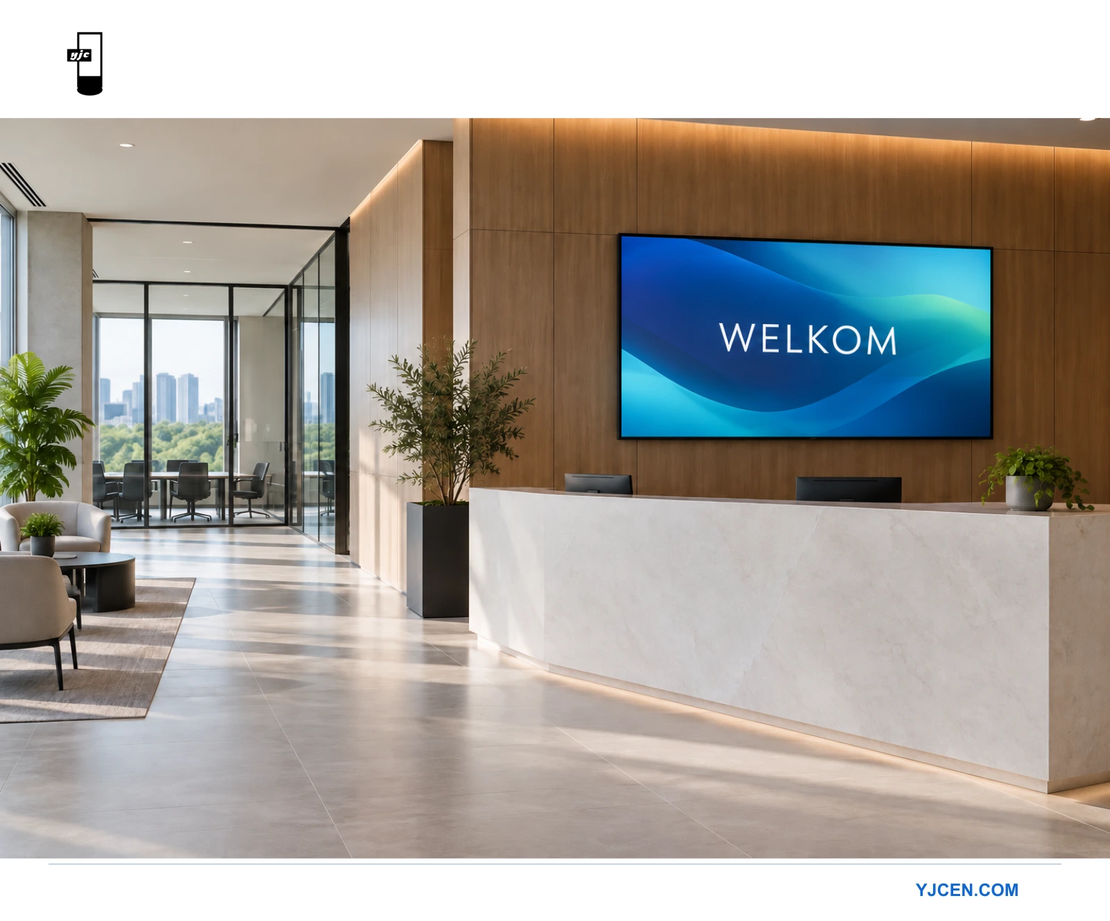 Welkomstdisplay aan de wand achter een moderne receptiebalie op kantoor